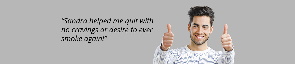 man with thumbs up because he quit smoking