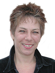 woman with cute haircut and big smile