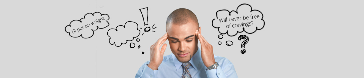 Man with head in hands questioning quitting smoking